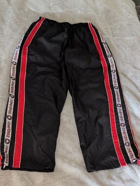 Vintage Converse Black Track Pants with Red Side Stripes and Logo Tape